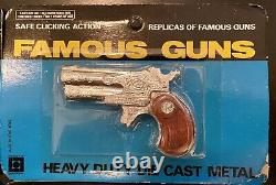 Full set of four vintage and very rare diecast miniature toy guns
