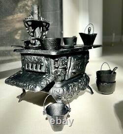 Vintage Collector's Item Crescent Miniature Black Cast Iron Stove Toy Full Set